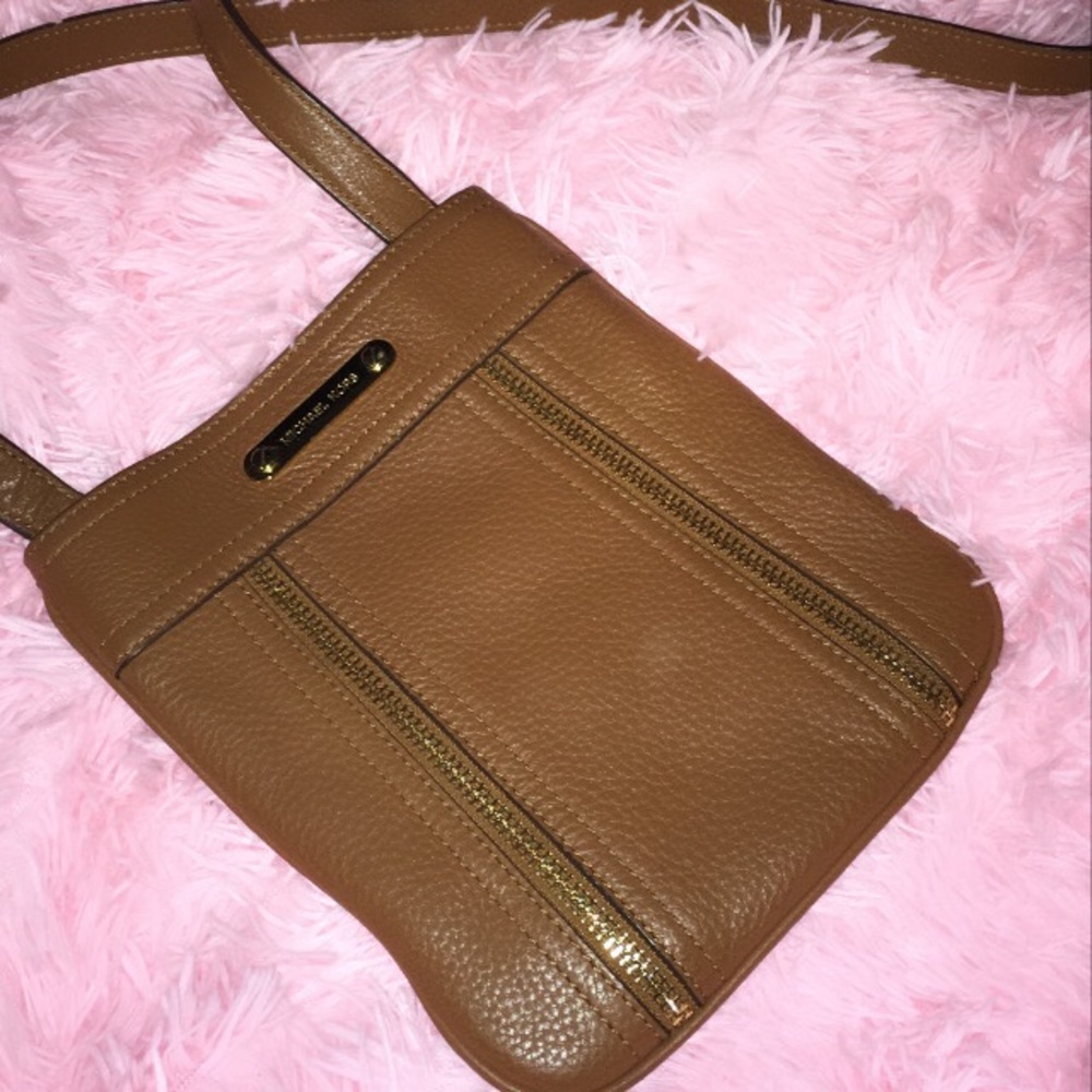 Michael Kors crossbody bag with designed zippers